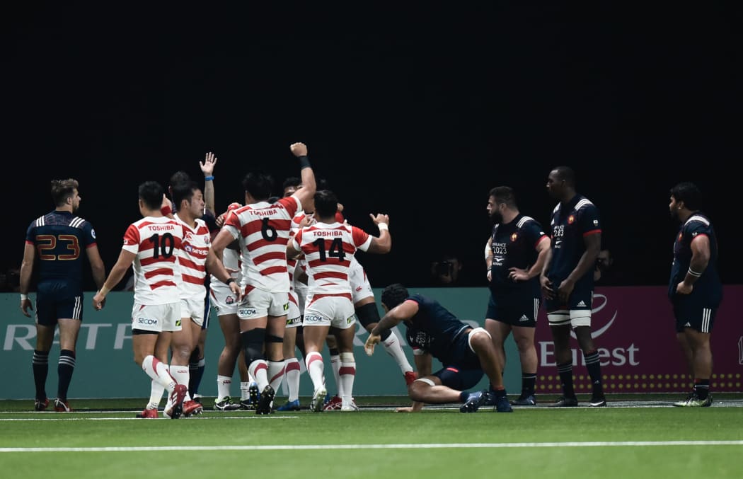 Japan celebrate a try.