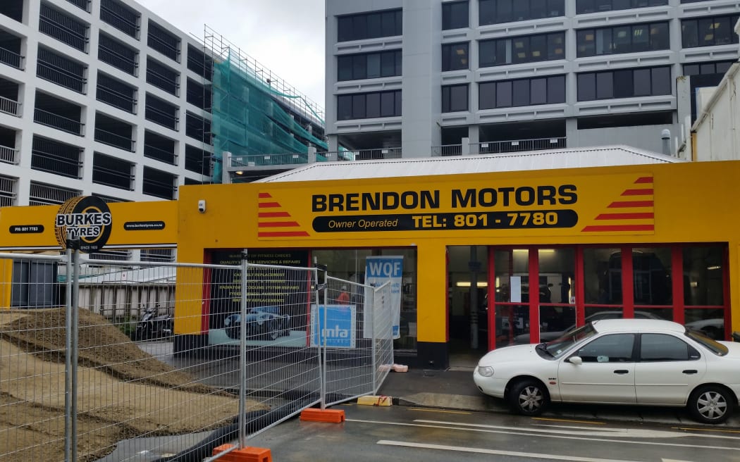 The extended cordon in central wellington will force the Brendon Motors outlet to close for months.