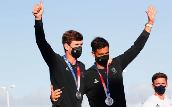 Peter Burling and Blair Tuke after winning silver in the men's 49er sailing event.