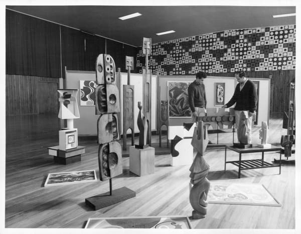 4.	Artists Cliff Whiting (left) and Paratene Matchitt in discussion during the installation of Contemporary Maori Painting and Sculpture (1966), St Paul’s Methodist Centre, Hamilton