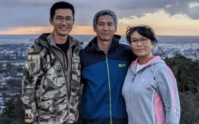 Evan Chen and his parents at Auckland's Mt Eden in 2024.