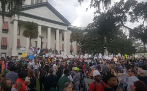 Students from Marjory Stoneman Douglas High School and supporters rally at Florida's Capitol in Tallahassee on Wednesday.