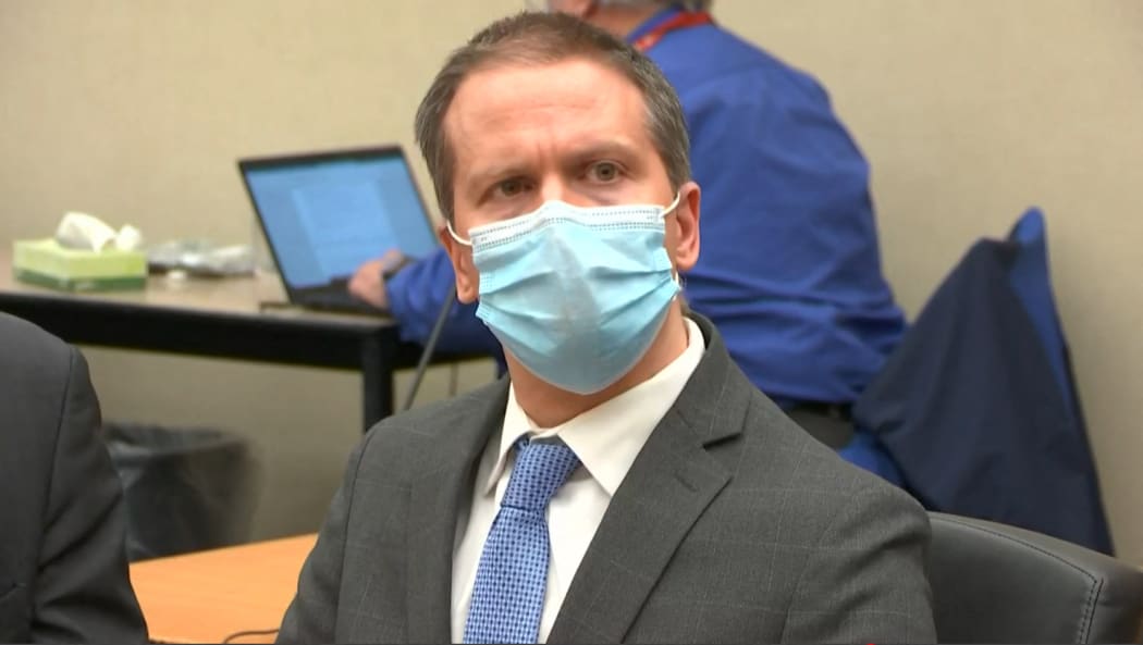 Former Minneapolis police officer Derek Chauvin listens to the verdict.