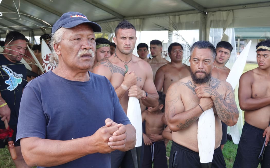 Joe Conrad, kaihautū (captain) of the great waka Ngātokimatawhaorua, briefs paddlers ahead of a training session for Waitangi Day 2025.