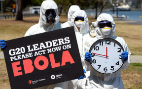 Protestors call for further action to fight Ebola in Brisbane on 15 November.