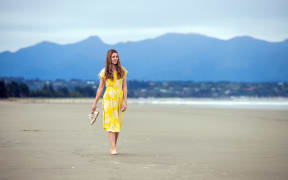 Picture by Tim Cuff 10 November 2020 - Writer Rebekah Ballagh, at home with daughter Mikah, and pug Jet in Brightwater, and on the beach at Rabbit Island, Nelson, New Zealand.
