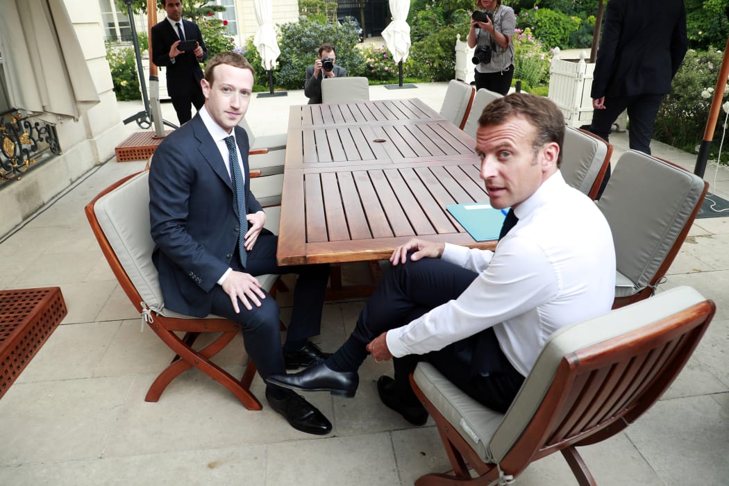 Facebook's CEO Mark Zuckerberg meets with French President Emmanuel Macron at the Elysee presidential palace following the "Tech for Good" summit in Paris.