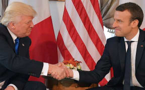 Donald Trump and Emmanuel Macron's news-making handshake.