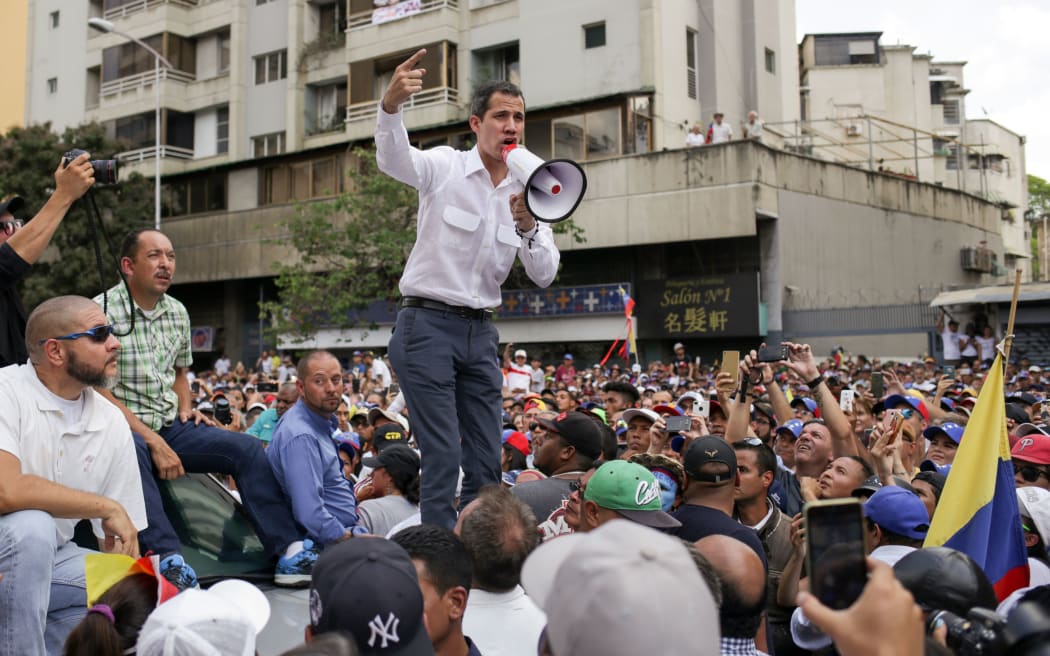 Venezuelan opposition leader and self-proclaimed acting president Juan Guaido speaks during a demo in Caracas on March 9, 2019