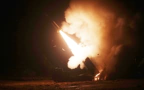 A South Korean Army Tactical Missile System (ATACMS) firing a missile from an undisclosed location on South Korea's east coast during a South Korea-US joint live-fire exercise aimed to counter North Korea’s missile test.