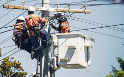 Linesmen at work doing repairs.