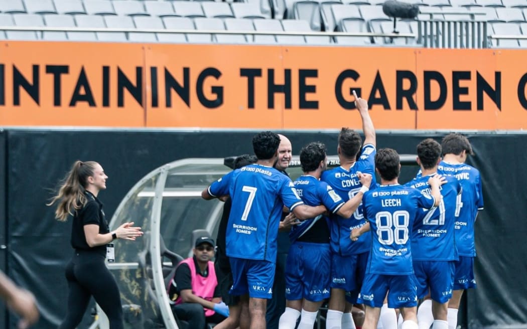 Winners South Melbourne celebrate after beating Tahiti United 2-1 at Eden Park.