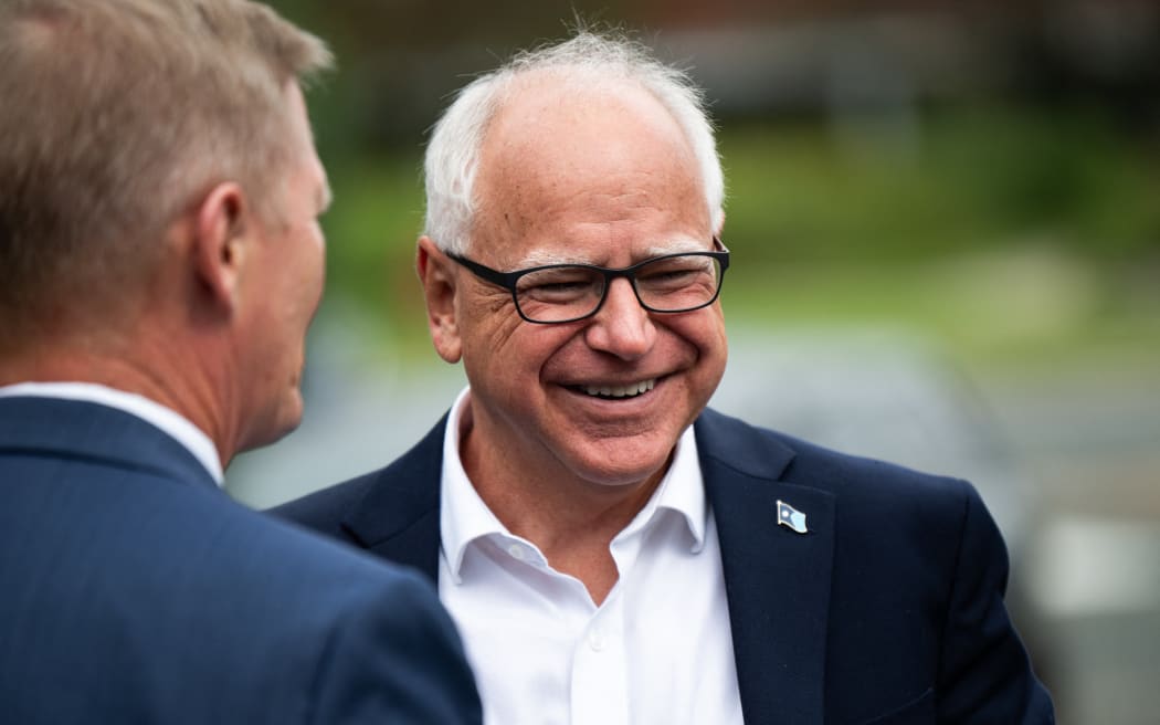 Minnesota Governor Tim Walz arrives to speak at a press conference regarding new gun legislation at City Hall on August 1, 2024 in Bloomington, Minnesota.