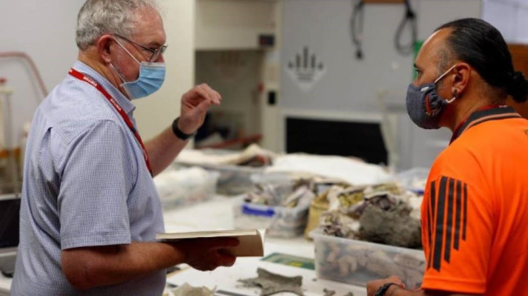 Palaeobiologist Dr Richard Holdaway discussing the moa bone sampling process with Te Ahu a Turanga Kaitiaki Terry Hapi at Te Manawa in Palmerston North.
