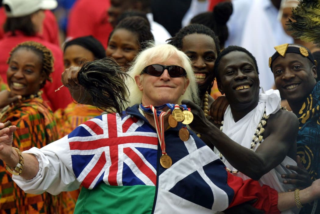 Jimmy Saville at the Queen's Golden Jubilee in June 2002, Buckingham Palace forecourt.