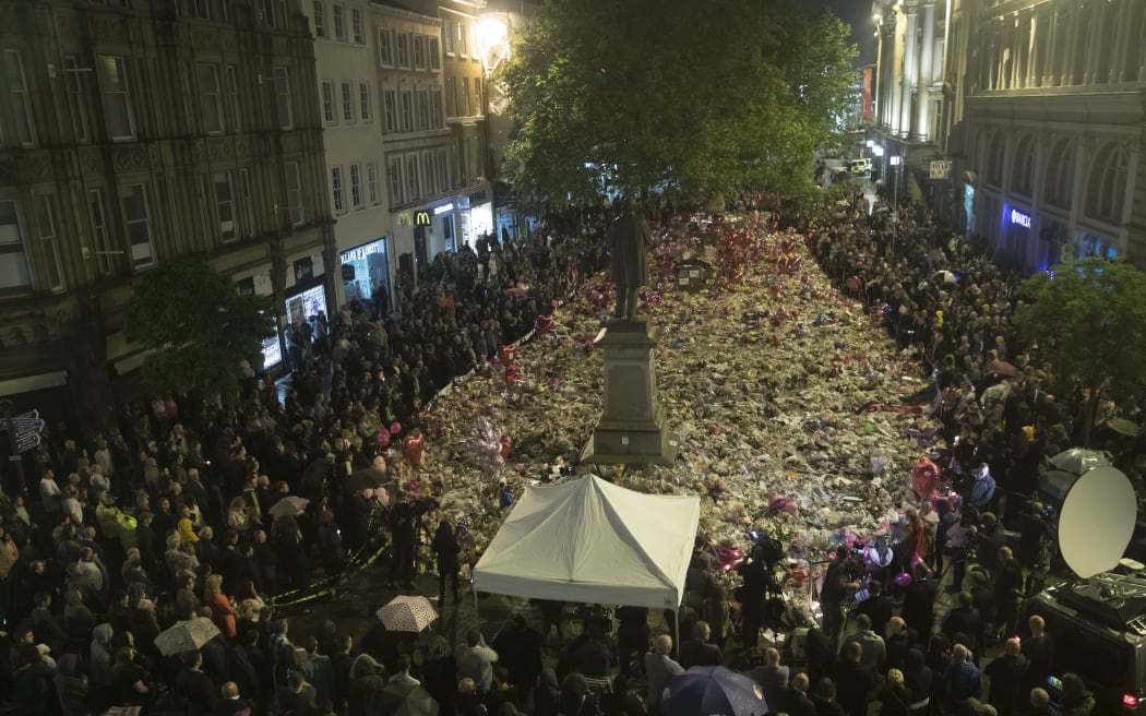 A vigil on St Ann's Square in Manchester, a week after the deadly bomb attack at Manchester Arena.