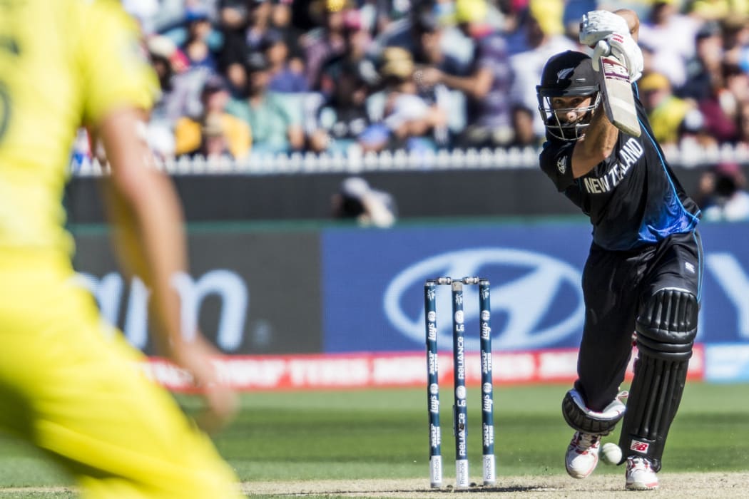 Grant Elliott plays a cover during the CWC final.
