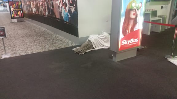 A stranded traveller found a spot to sleep.