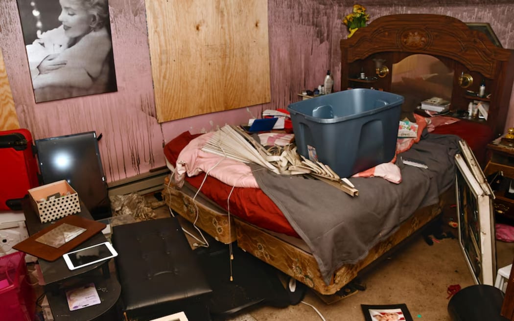 The man said he originally stayed in an upstairs bedroom before moving to a smaller space.