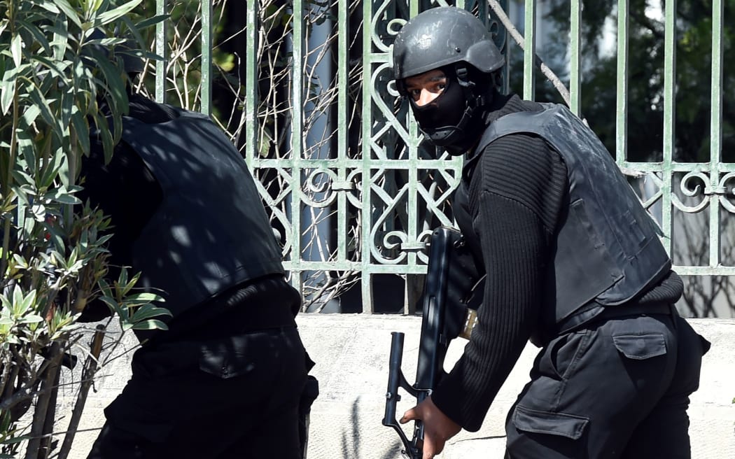 Tunisian security forces secure the area after gunmen attacked Tunis' famed Bardo Museum.
