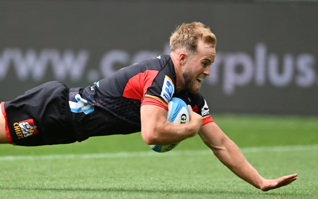 Xavier Roe dives to score.