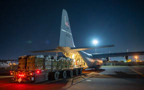 In this image obtained from the US Department of Defense, over 38,000 meals Ready-to-Eat and water destined for an airdrop over Gaza are loaded aboard a US Air Force C-130J Super Hercules at an undisclosed location in Southwest Asia on March 1, 2024. Israel's top ally the US said it began air-dropping aid into war-ravaged Gaza on March 2, 2024, as the Hamas-ruled territory's health ministry reported more than a dozen child malnutrition deaths.