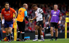 Fiji's Eroni Sau leaves the field in Cardiff after receiving a red card.