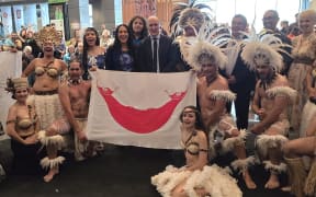 The Puku Rangi Tea performance group from Rapa Nui, holding the flag of Rapa Nui.  The group performed at Te Papa to a packed out crowd.