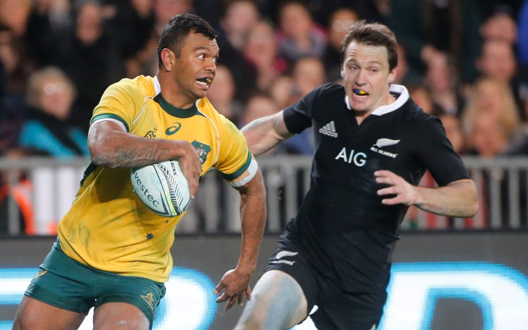 New Zealand's Ben Smith chases Australia's Kurtley Beale. Eden Park. 2014.