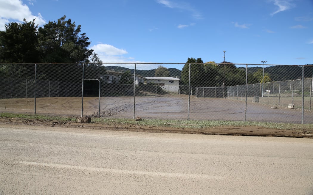 The Taneatua tennis courts were left covered in mud.