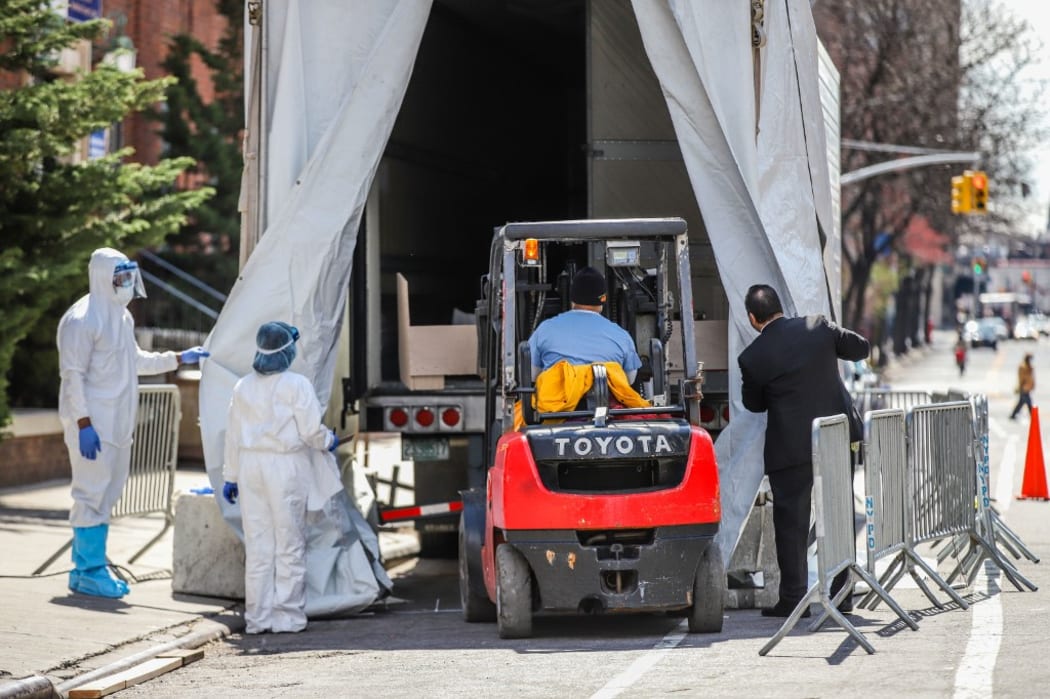 A refrigerated try with a frigurific truck is used as a morgue at The Brooklyn Hospital Center in New York during the coronavirus Covid-19 pandemic in the United States.