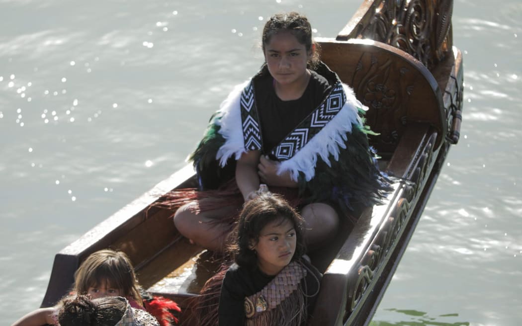 Children in the Waka parade.