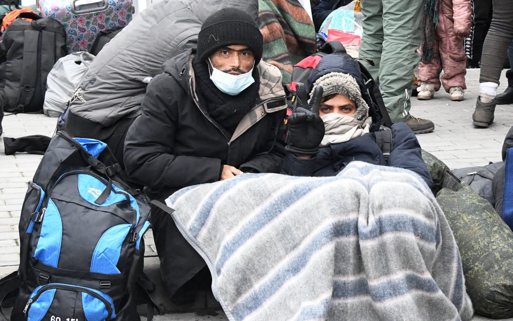 6696065 15.11.2021 Refugees gather at the Bruzgi-Kuznica Bialostocka border crossing near the Belarusian-Polish border, Belarus.