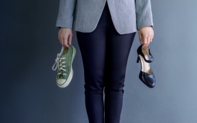 Work Life Balance Concept, present by Business Working Woman holding a High Heal and Sneaker Shoes, Croped image with Copy Space