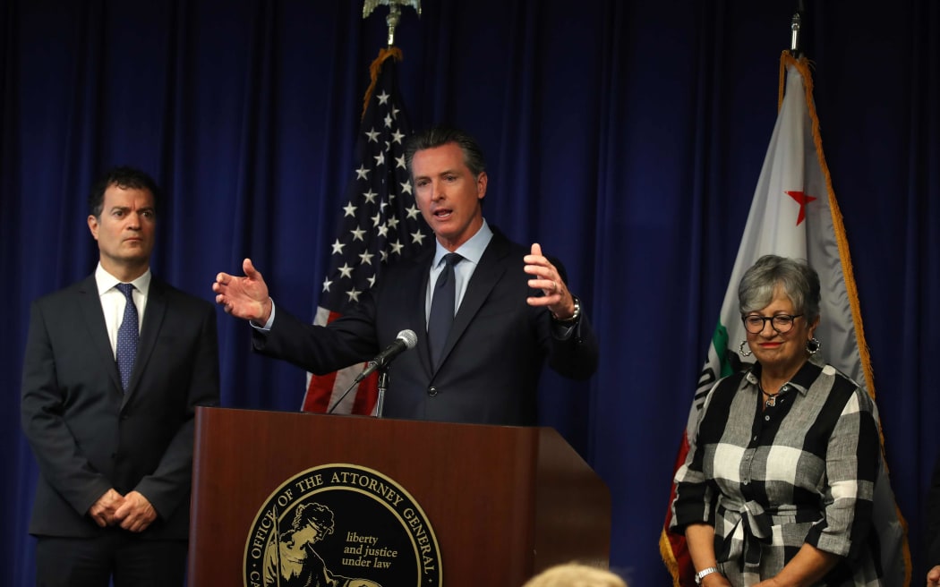 California governor Gavin Newsom, centre, with the state's attorney general Xavier Becerra and air resources board chair Mary Nichols, at a news conference in response to the Trump Administration's plan to revoke Californias waiver to establish vehicle emissions standards.