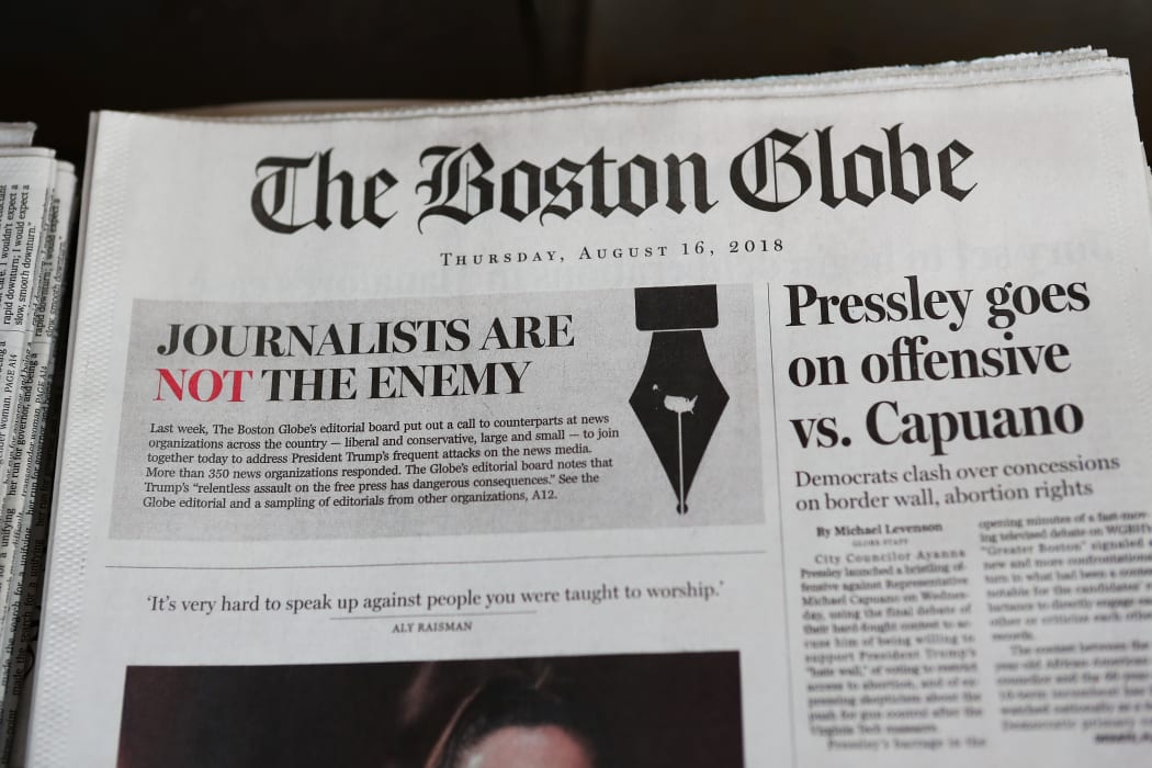 Hundreds of U.S. newspapers joined together and published editorials decrying President Donald Trump's description of the media as the "enemy of the people."