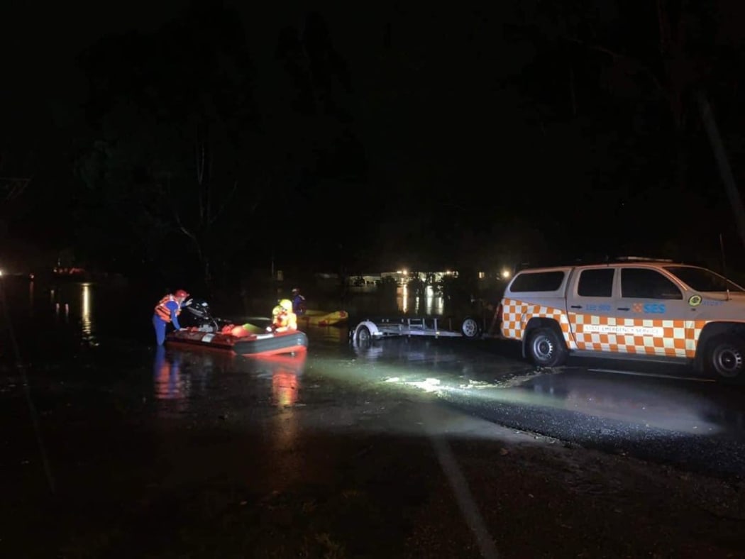 New South Wales state emergency service teams rescued three people, along with 25 dogs and four sheep, from floodwaters in Londonderry, western Sydney.