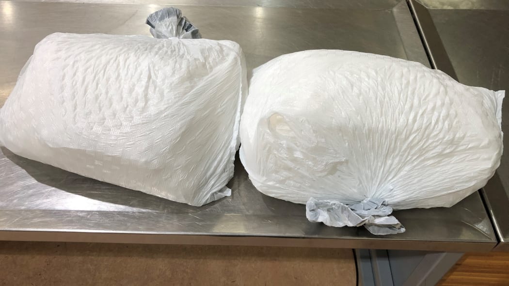 Two bags of methamphetamine weighing 20kg were found in a suitcase.