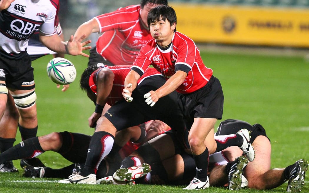 Japan XV's Fumiaki Tanaka makes a pass out from a ruck. Rugby Union, North Harbour v Japan XV at North Harbour Stadium, Albany, Auckland, New Zealand. Friday 4th June 2010. Photo: Anthony Au-Yeung/PHOTOSPORT