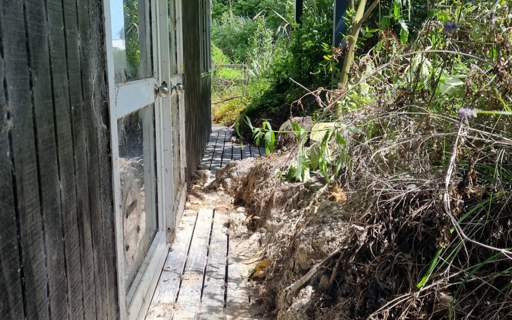 Phillipa Miller-Ibos at her flood-damaged home in Auckland.