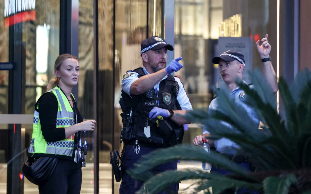 Police examine the site outside the Westfield Bondi Junction shopping mall after a stabbing incident in Sydney on April 13, 2024. Australian police on April 13 said they had received reports that "multiple people" were stabbed at a busy shopping centre in Sydney. (Photo by David GRAY / AFP)