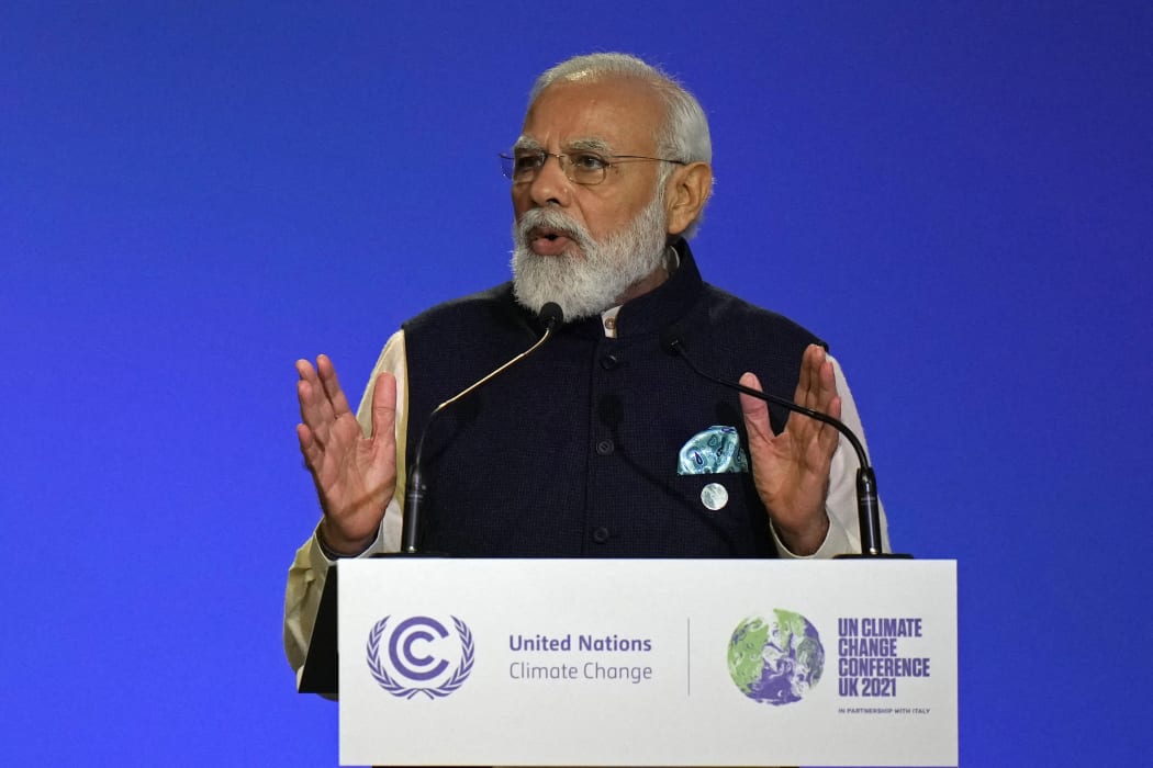 India's Prime Minister Narendra Modi presents his national statement at the COP26 UN Climate Change Conference in Glasgow, Scotland, 1 November 2021.