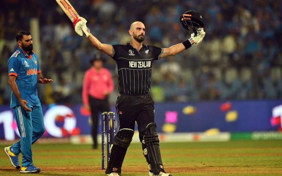 New Zealand's Daryl Mitchell celebrates his century during the ICC Cricket World Cup 2023 Semi-Finals 1 match between New Zealand and India at the Wankhede Stadium in Mumbai, Maharashtra, India. Wednesday, 15 November 2023. Copyright Photo: Raghavan Venugopal / www.photosport.nz