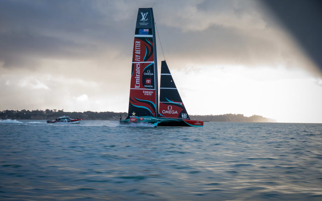 Emirates Team New Zealand new AC75 is rolled out of the shed for the first time in preparation for commissioning.