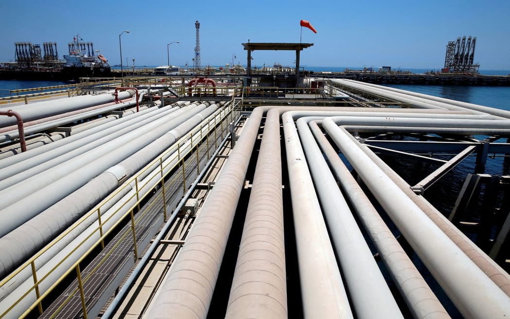 In this 2018 photo, an oil tanker is being loaded at Saudi Aramco's Ras Tanura oil refinery and oil terminal in Saudi Arabia.
Mandatory Credit:	Ahmed Jadallah/Reuters/File via CNN Newsource