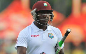 West Indies cricketer Denesh Ramdin trudges off the pitch.