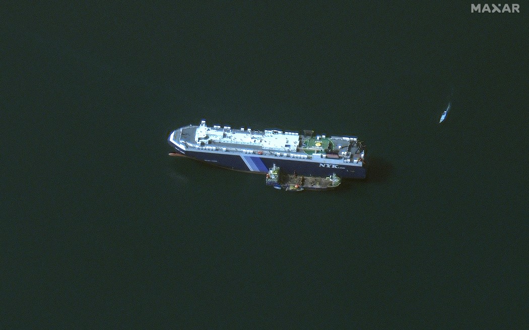 (FILES) This handout satellite picture released by Maxar Technologies on November 28, 2023, shows the recently seized Isreali-linked Galaxy Leader ship, that was captured by Huthi fighters on November 19, next to a support vessel in the southern Red Sea near Hodeida, Yemen. Heavy air strikes pounded rebel-held cities in Yemen early on January 12, 2024, according to the Huthi rebels' official media and AFP correspondents. The capital Sanaa, Hodeida and Saada were all targeted, the Huthis' official media said, blaming "American aggression with British participation". (Photo by Satellite image ©2023 Maxar Technologies / AFP) / RESTRICTED TO EDITORIAL USE - MANDATORY CREDIT "AFP PHOTO / Satellite image ©2023 Maxar Technologies" - NO MARKETING NO ADVERTISING CAMPAIGNS - DISTRIBUTED AS A SERVICE TO CLIENTS - THE WATERMARK MAY NOT BE REMOVED/CROPPED -