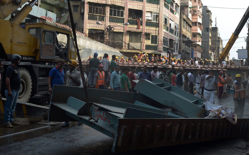 Rescuers have worked through the night to save trapped victims