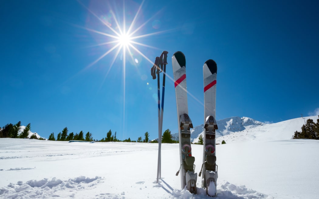 Skiing, winter season , mountains and ski equipment on ski run