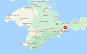 A Ukrainian attack on the Crimean port of Feodosia damaged a large Russian landing ship and killed one person, Moscow said on 26 December, 2023.